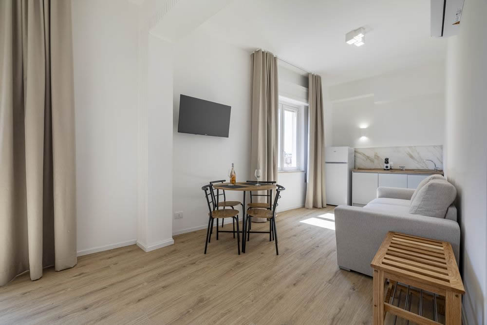 Appartamento con cucina attrezzata e soggiorno a Dimora Largo Franch&igrave; Apartments Trapani